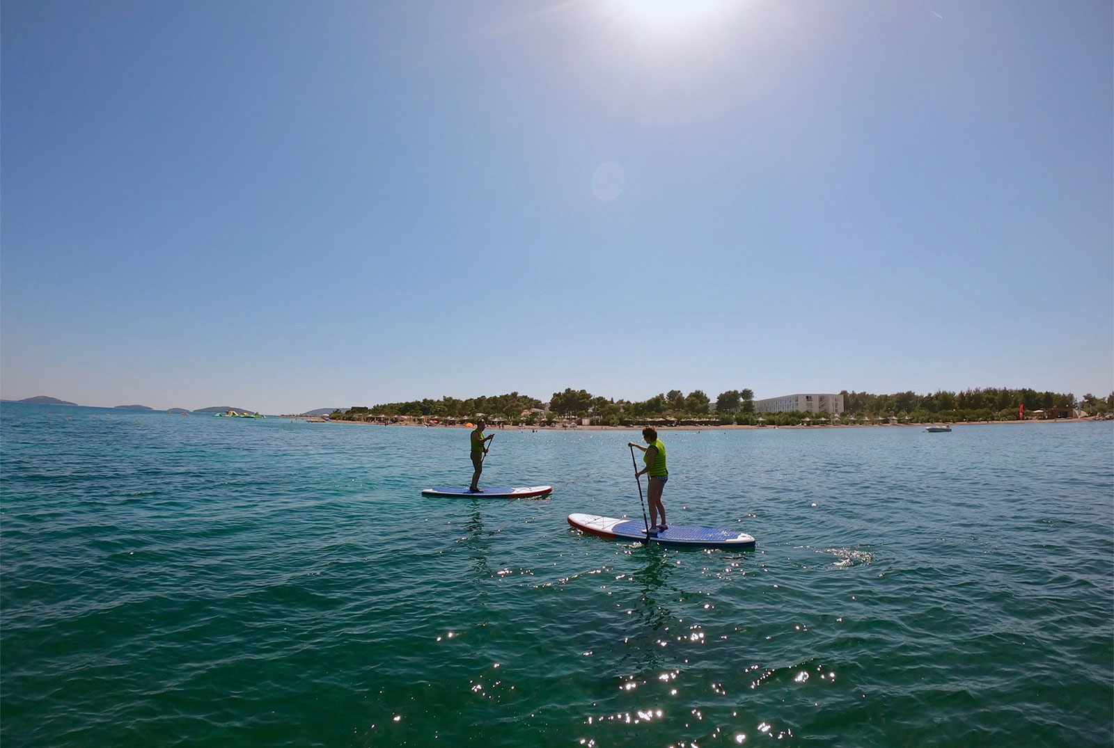 SUP-couple-in-the-bay-scaled