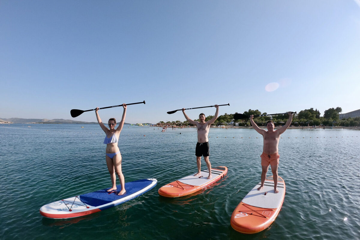 SUP fun on crystal clear Adriatic Sea in Amadria Park Šibenik with Windrose centre